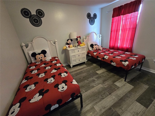 bedroom featuring dark hardwood / wood-style flooring