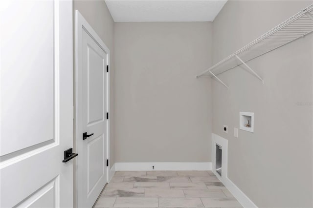 9095 SW 125th Ter, Dunnellon, FL 34432 - laundry room with hookup for a washing machine, hookup for an electric dryer, and baseboards