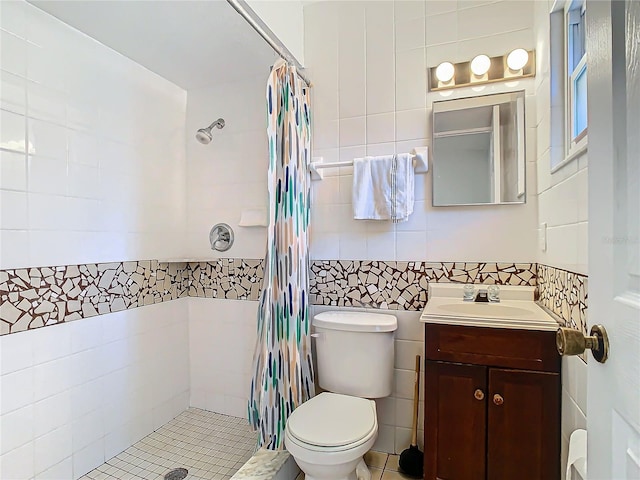 bathroom featuring tile walls, decorative backsplash, vanity, walk in shower, and toilet