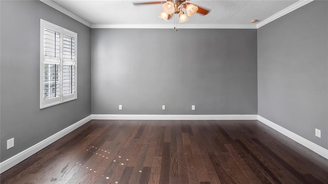 empty room with crown molding, ceiling fan, and dark hardwood / wood-style flooring