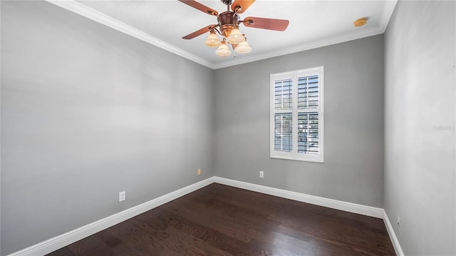 empty room featuring wood-type flooring, ornamental molding, and ceiling fan