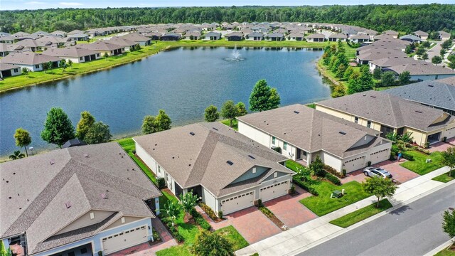 17597 Summersweet Way, Clermont, FL 34714 - aerial perspective of suburban area with a nearby body of water