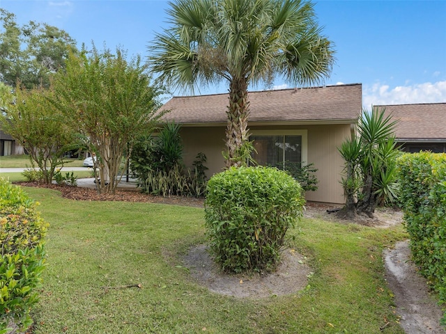 exterior space featuring a front yard