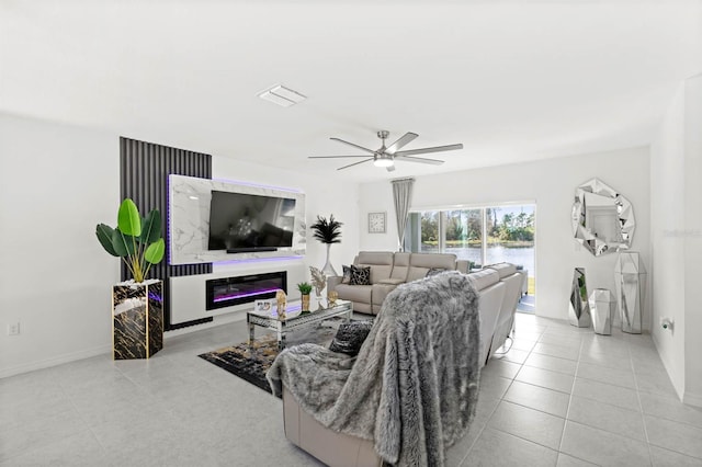 tiled living room featuring ceiling fan