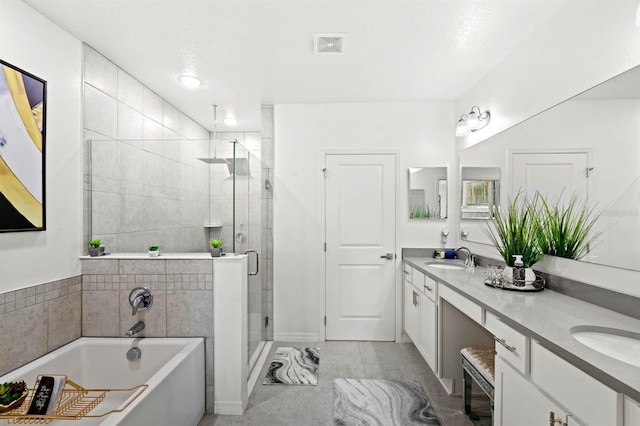 bathroom with plus walk in shower and vanity