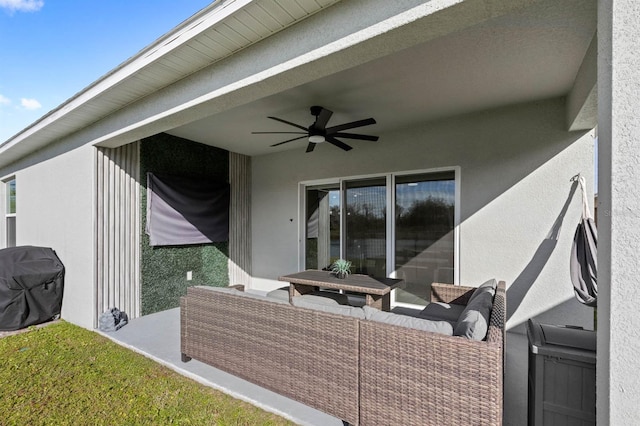 view of patio featuring area for grilling, an outdoor living space, and ceiling fan