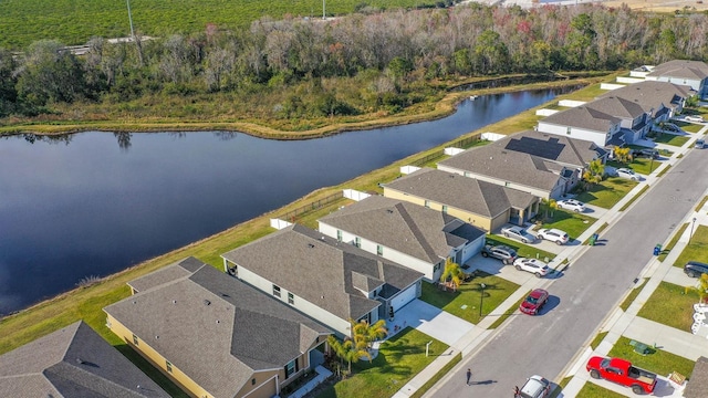 drone / aerial view featuring a water view