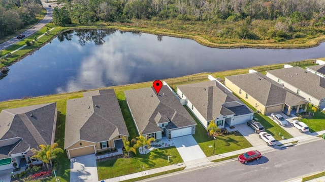 bird's eye view with a water view