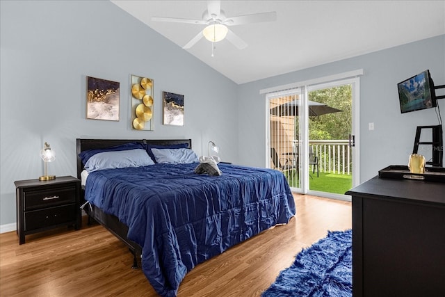 bedroom with access to exterior, wood-type flooring, ceiling fan, and vaulted ceiling