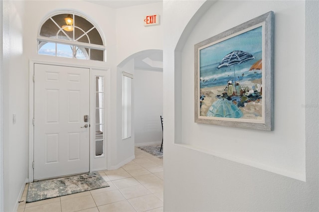 foyer entrance featuring light tile patterned floors