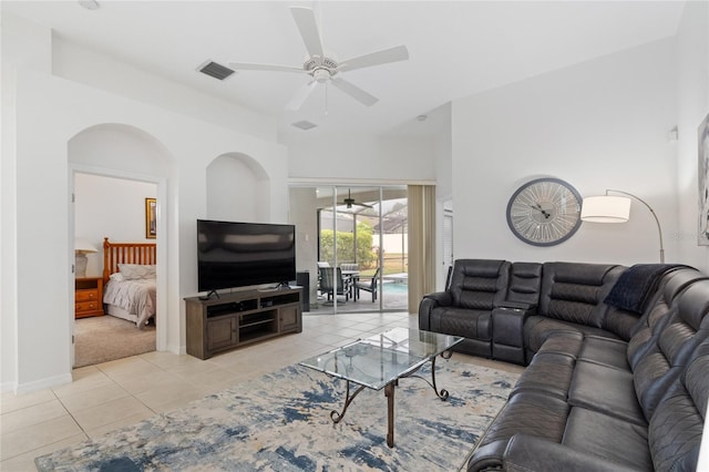 living room with light tile patterned flooring and ceiling fan