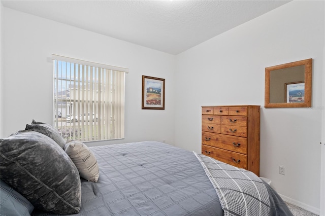 bedroom featuring a textured ceiling