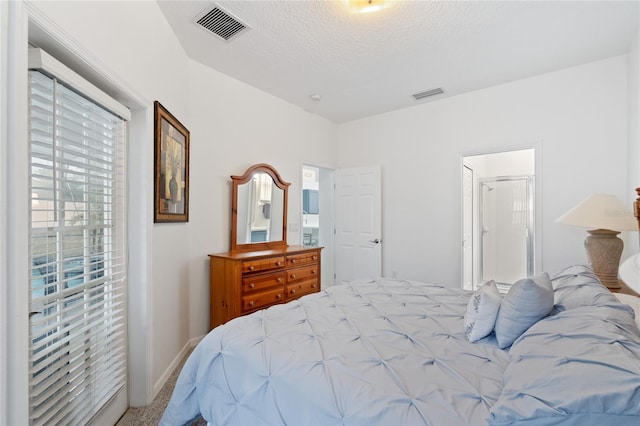 bedroom featuring a textured ceiling