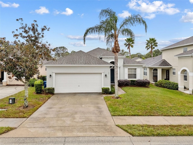 view of front facade featuring a garage and a front yard