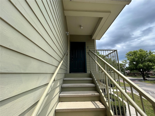 property entrance with a balcony