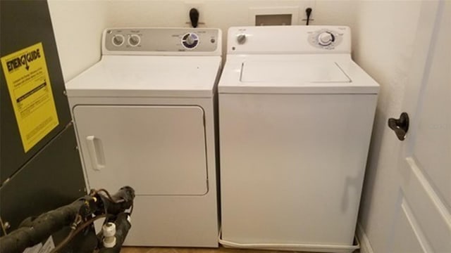 laundry room with washing machine and dryer and laundry area