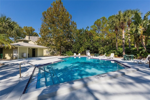 pool with a patio