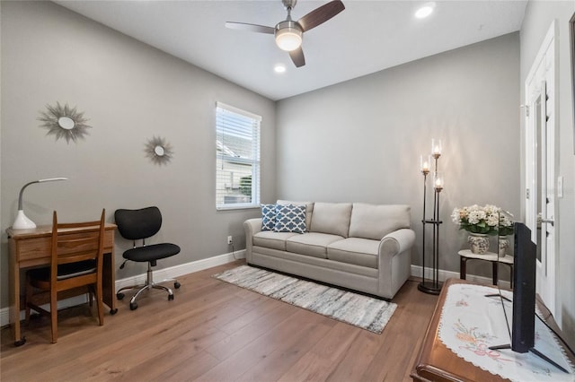 office area featuring wood-type flooring and ceiling fan