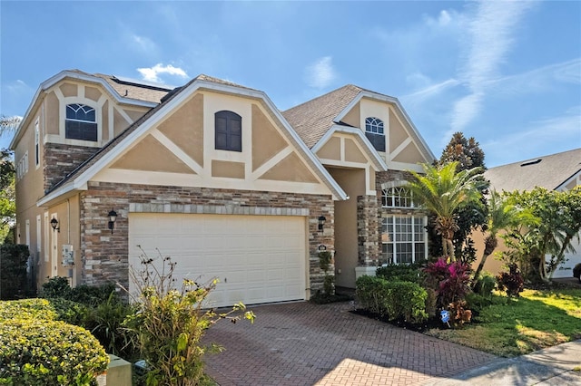 view of front of property with a garage