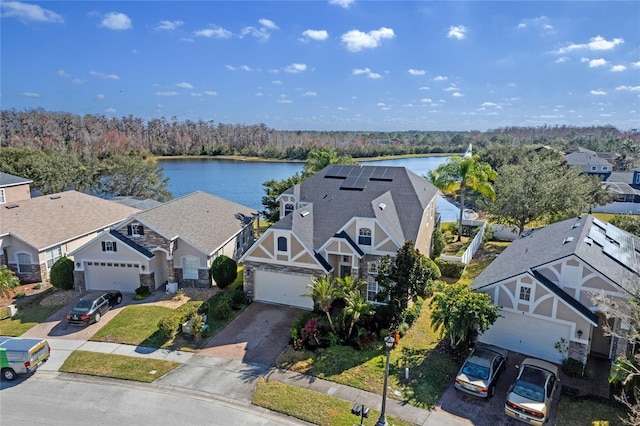 drone / aerial view with a water view