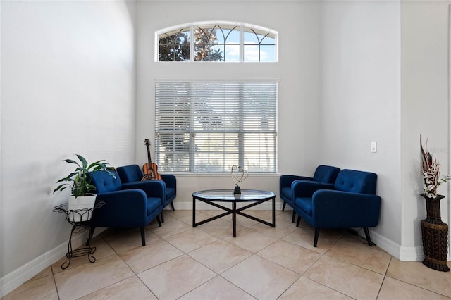 living area featuring light tile patterned flooring