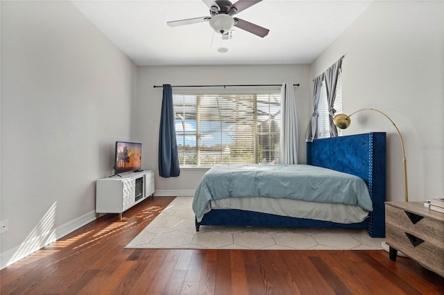 bedroom featuring ceiling fan and wood-type flooring