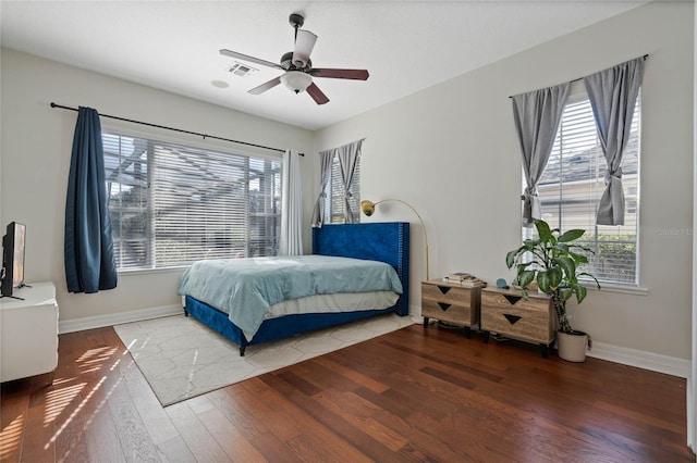 bedroom featuring ceiling fan and hardwood / wood-style floors