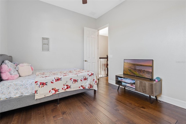 bedroom featuring dark hardwood / wood-style floors and ceiling fan