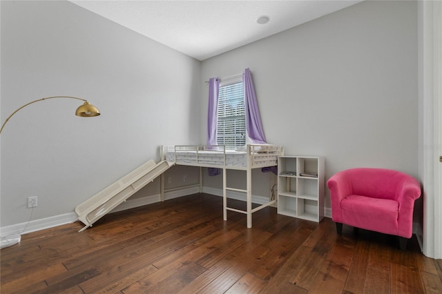 bedroom featuring dark hardwood / wood-style floors