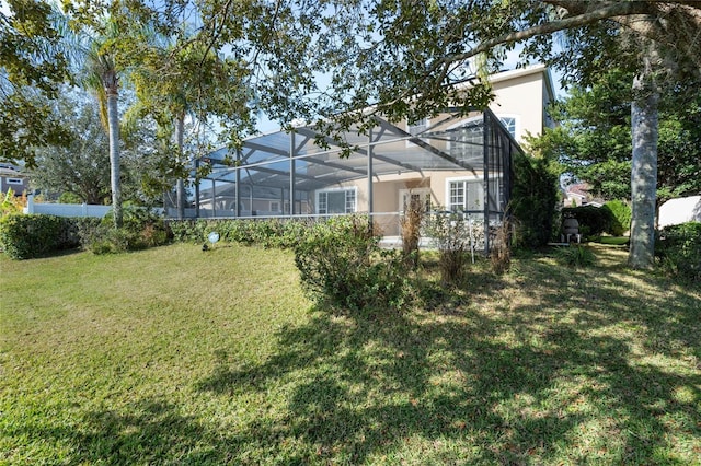 view of yard featuring a lanai