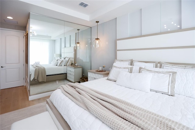 bedroom with light wood-type flooring