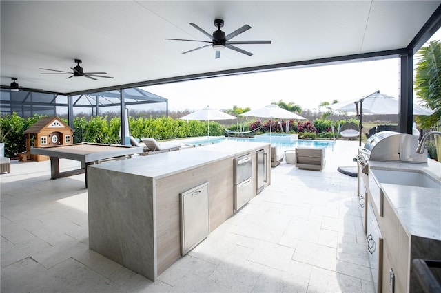 view of patio / terrace with exterior kitchen