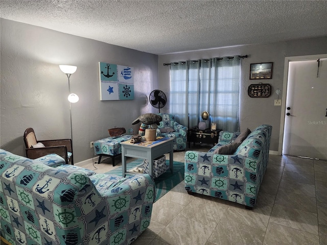 living room with a textured ceiling