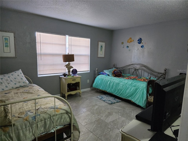 bedroom with a textured ceiling