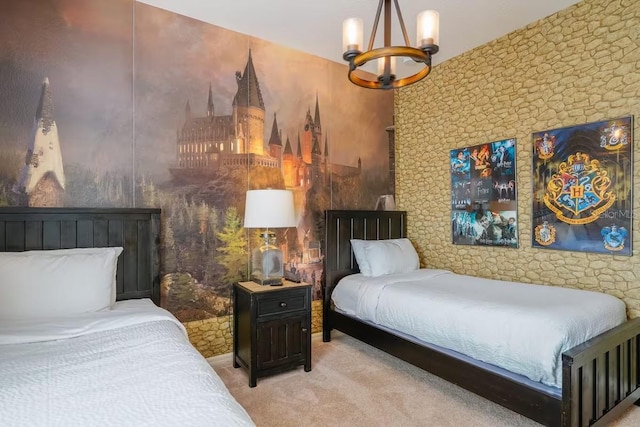 carpeted bedroom with a chandelier