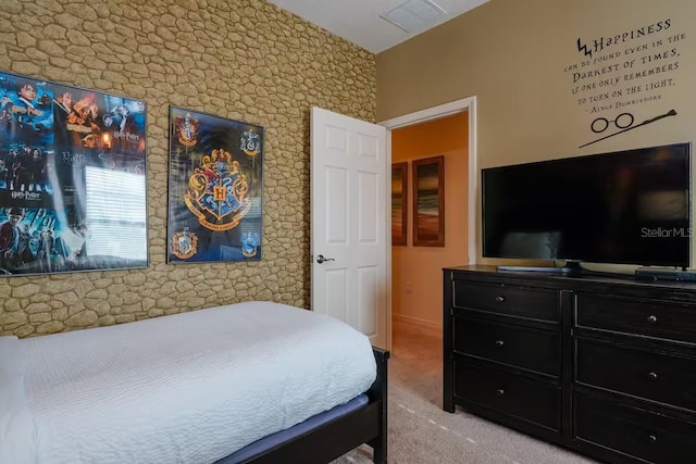 bedroom with light colored carpet