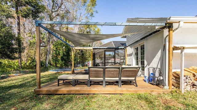 view of patio / terrace with a wooden deck and glass enclosure