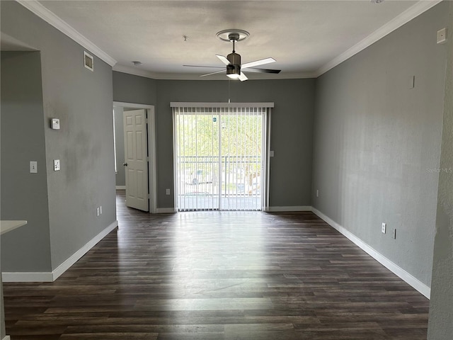 spare room with crown molding, dark wood-type flooring, and ceiling fan