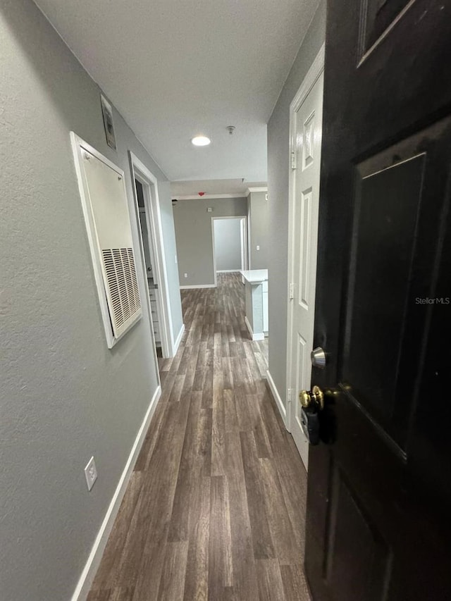 hallway featuring hardwood / wood-style flooring