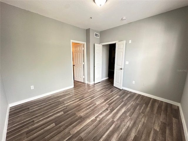 interior space with dark wood-type flooring