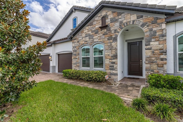 view of front of property with a garage