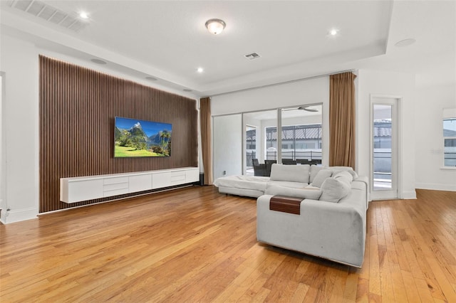 living room with light hardwood / wood-style floors