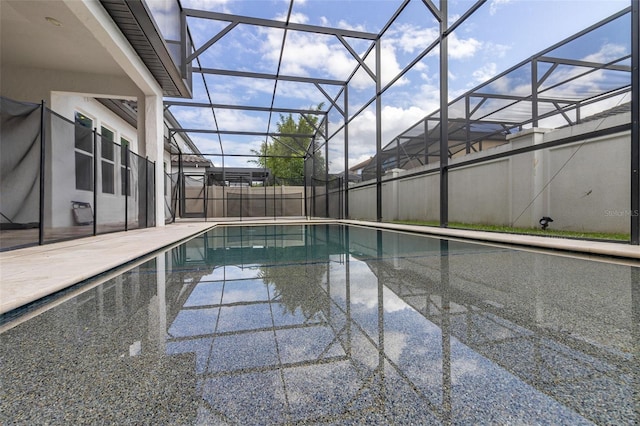 view of pool with a lanai and a patio