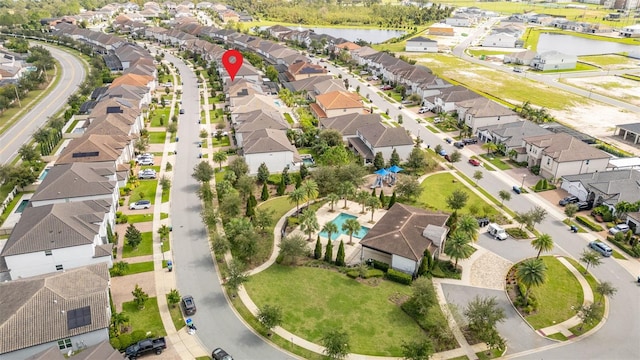 drone / aerial view featuring a water view