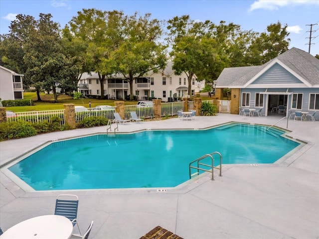 view of swimming pool featuring a patio