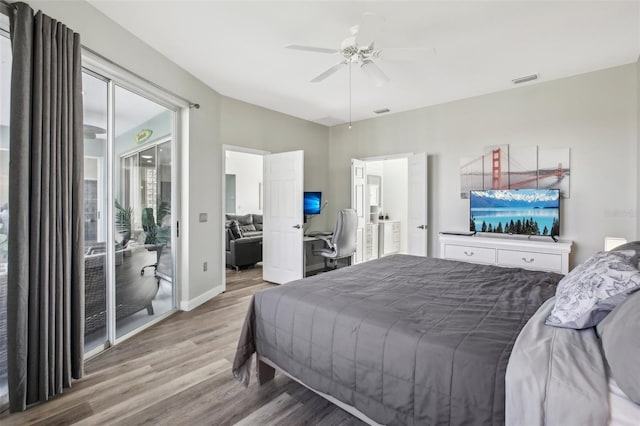 bedroom with hardwood / wood-style flooring, access to exterior, and ceiling fan