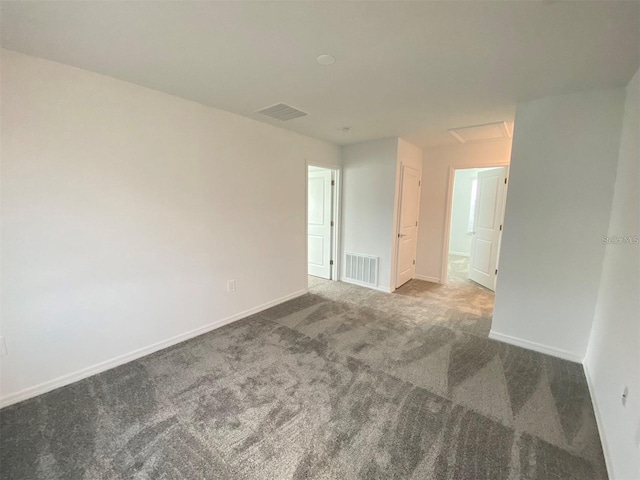 empty room featuring carpet floors