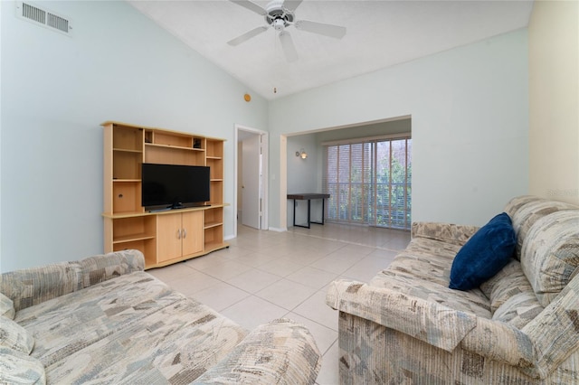 tiled living room featuring vaulted ceiling and ceiling fan