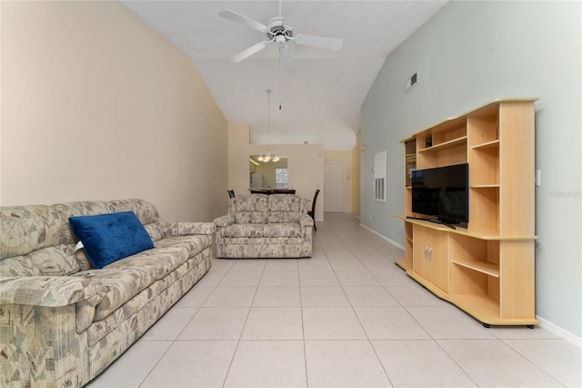 living room with ceiling fan, high vaulted ceiling, and light tile patterned floors