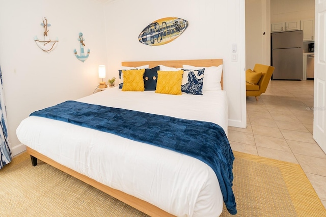 tiled bedroom featuring stainless steel refrigerator